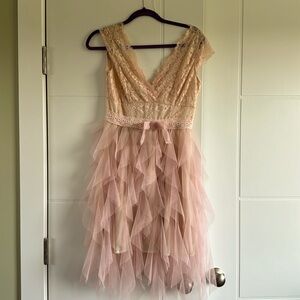 Never worn party dress. Size Medium.